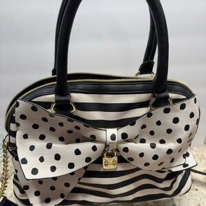 Chic Black and White Striped Handbag with Polka Dot Bow